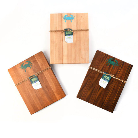 3 small wood cutting boards with a crab inlaid on top. Maple, Cherry, Walnut.