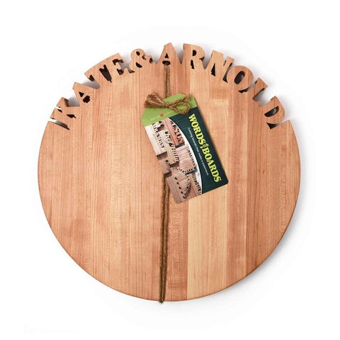 Names Kate and Arnold cut out around the top of a Round Maple Cutting Board