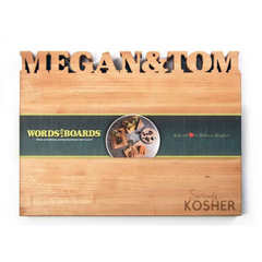 Light Wood Kosher horizontal rectangle wood cutting board with the names Megan and Tom cutout on top. The bottom is engraved with the word Kosher.